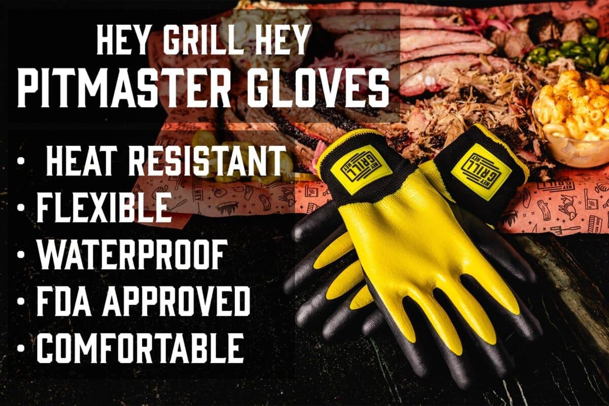 Black and yellow grill gloves on the counter next to the barbecue food plate. The text reads "Hey grill hey pitmaster gloves.:"