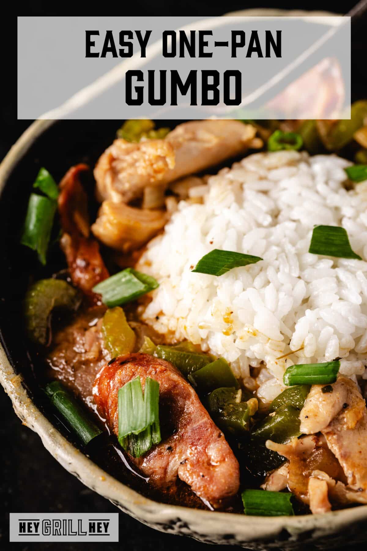 A bowl of sausage gumbo and rice. The text overlay reads "Easy One-Pan Gumbo" at the top, and "Hey Grill Hey" at the bottom.