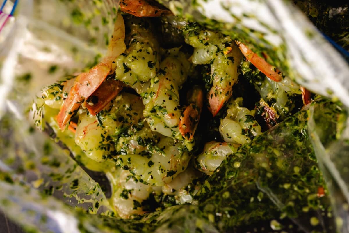 Shrimp marinating in a zip-top bag.